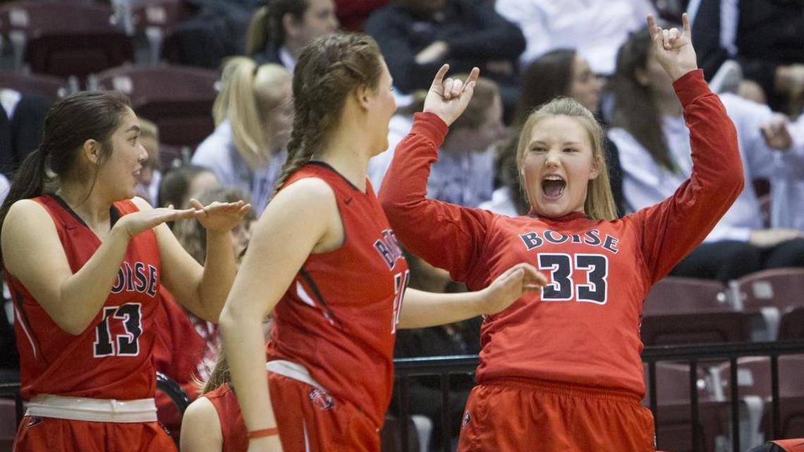 Boise’s Breana Hallam (33) celebrates a basket during last year’s 5A state tournament at the Ford Idaho Center.
