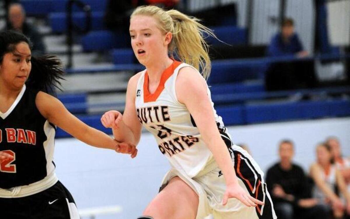 Butte County’s Macy Hansen drives past a Sho-Ban defender in the 1A Division II District Five-Six semifinals Feb. 2 at Firth High.