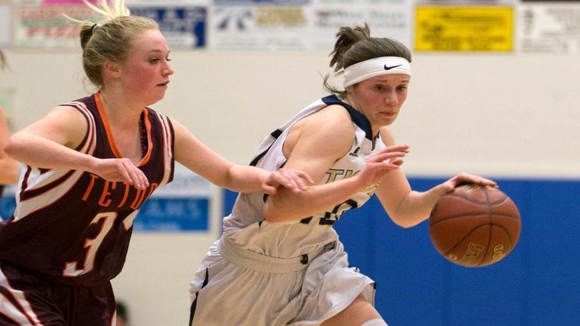 Timberlake’s Allison Kirby drives to the basket during the opening round of the 3A tournament at Middleton High.