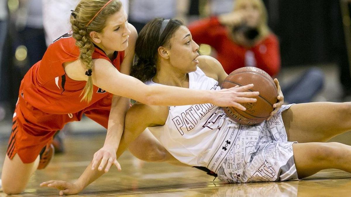 Centennial’s Ayana Amaechi, right, steals the ball from Boise’s Audrey Dingel during the 5A girls basketball state semifinals Friday at the Ford Idaho Center in Nampa. Centennial won. 55-43.