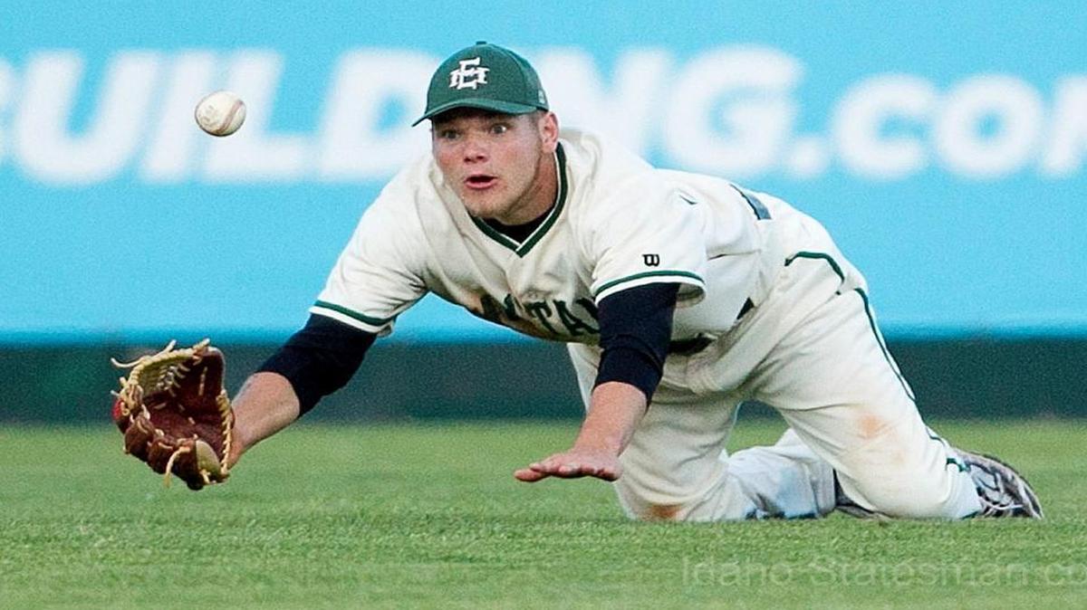 Eagle outfielder Braden Guerrero dives for a fly ball during the 2016 5A state tournament at Memorial Stadium.