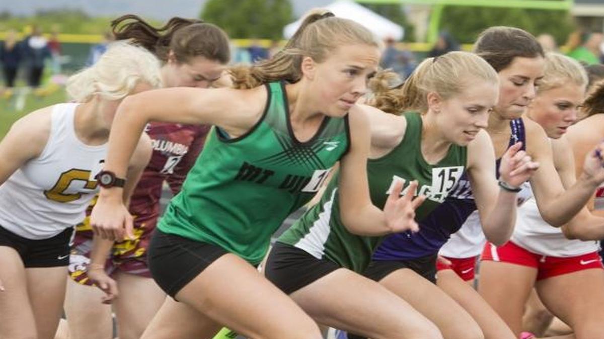 Mountain View freshman Lexy Halladay, left, breaks off the starting line in the 1,600-meter race at the 5A District Three track meet on May 12.