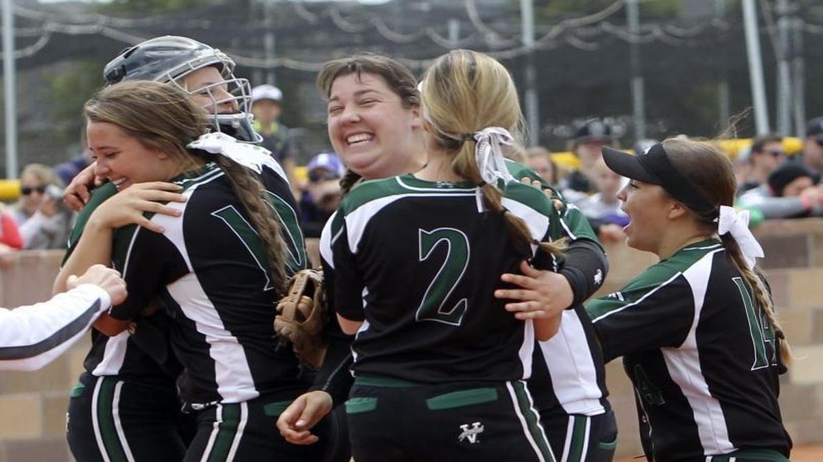 Eagle players celebrate beating Rocky Mountain to win the 5A state softball tournament championship Sunday at Mountain View High in Meridian.