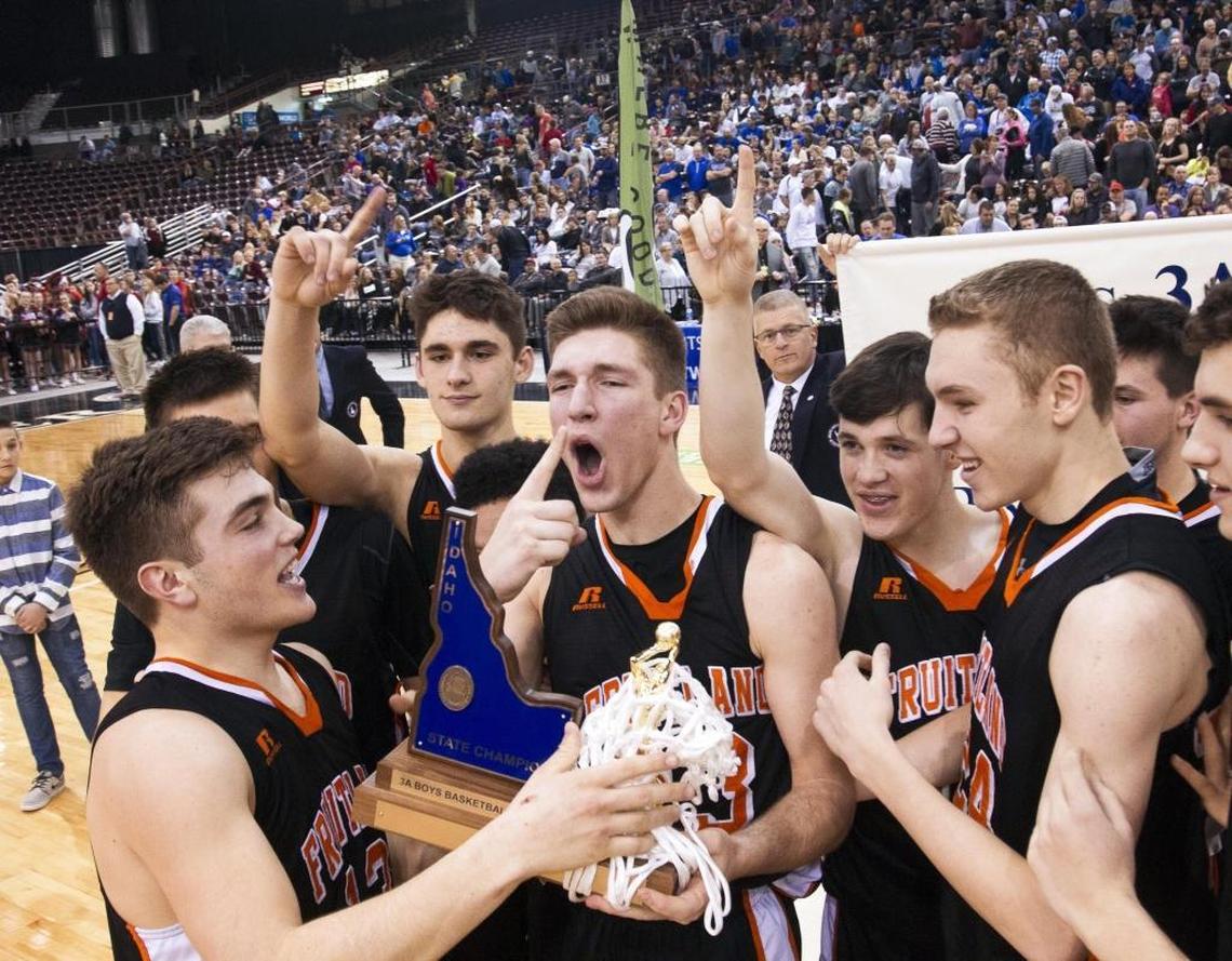Fruitland celebrates with the 3A state title after beating Kimberly 62-41 last year at the Ford Idaho Center in Nampa.