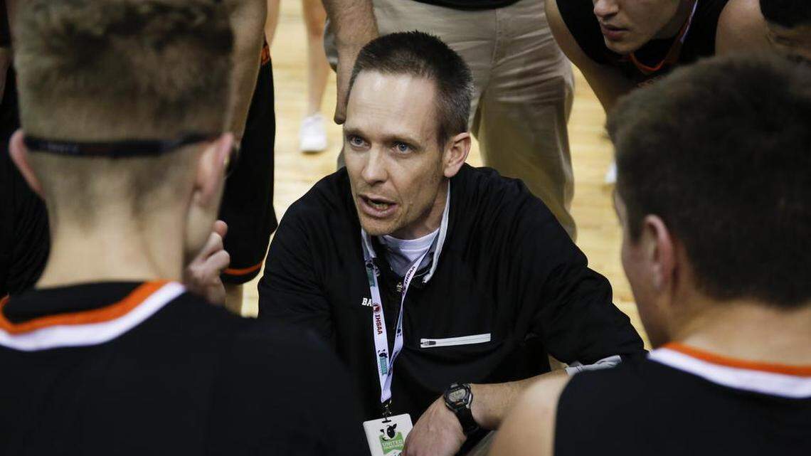 Fruitland head coach Mike Fitch talks to his players during the second half of the 3A state championship against Parma in Nampa, Idaho, on Saturday, March 5, 2016. Parma won 56-47.