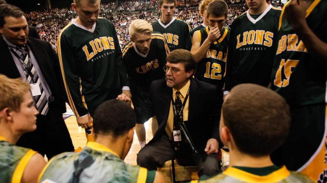 Borah coach Cary Cada talks to his team during a timeout in the 5A state championship game March 2, 2013, at the Ford Idaho Center in Nampa. Borah beat Rocky Mountain 47-44.