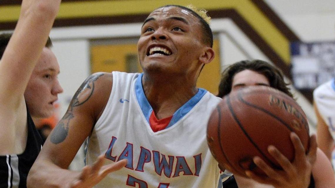 Ivory Miles-Williams drives to the basket during Lapwai’s 97-57 win over Horseshoe Bend in the first round of the 1A Division I state tournament March 2 at Vallivue High in Caldwell.