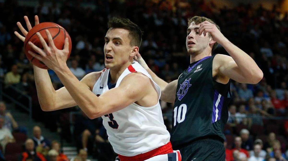 Skyview High graduate Kyle Dranginis grabs a rebound for Gonzaga during a West Coast Conference tournament game against Portland in March.