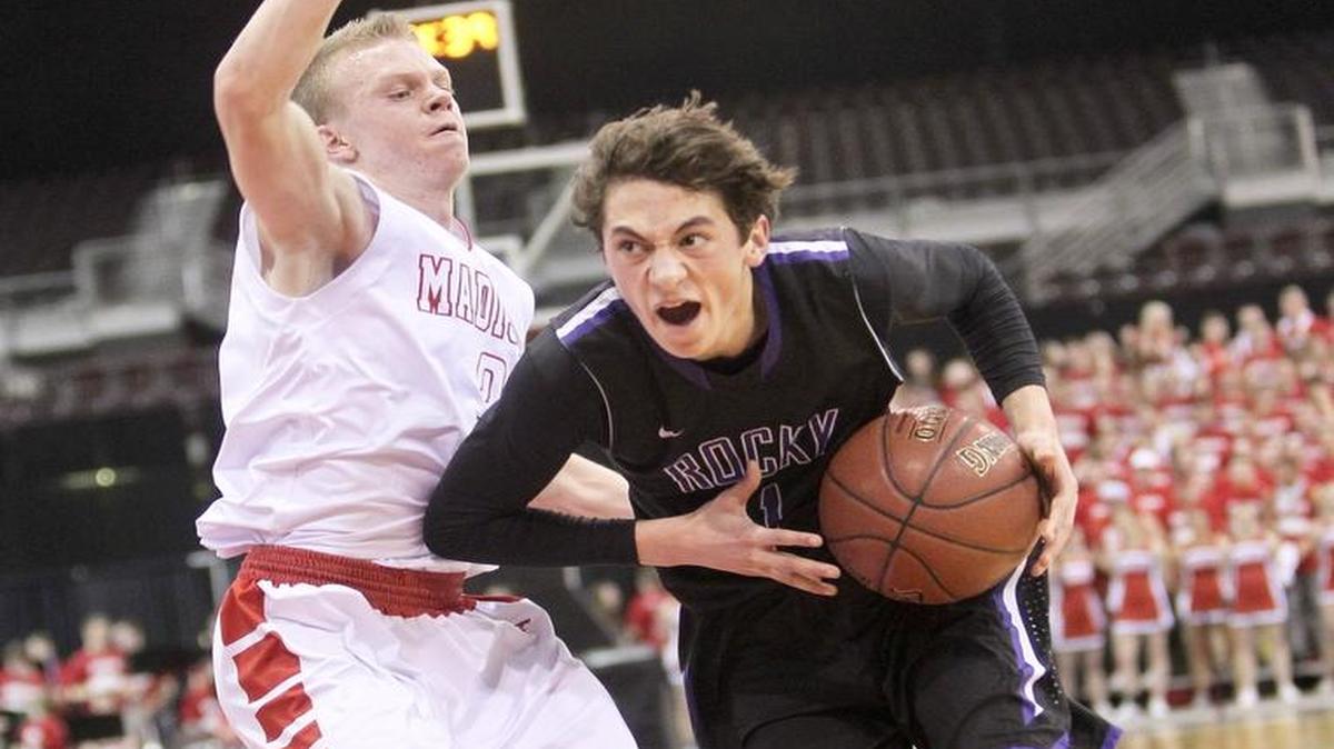 Rocky Mountain’s Kobe Terashima drives to the basket against Madison during the 5A state tournament last year at the Ford Idaho Center.