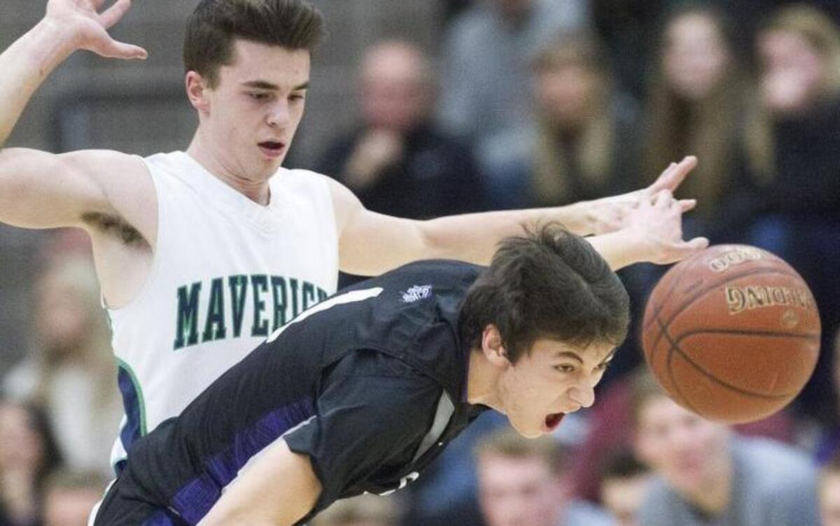 Rocky Mountain’s Kobe Terashima steals a pass intended for Mountain View’s Spencer Erickson on Jan. 27 at Mountain View High.
