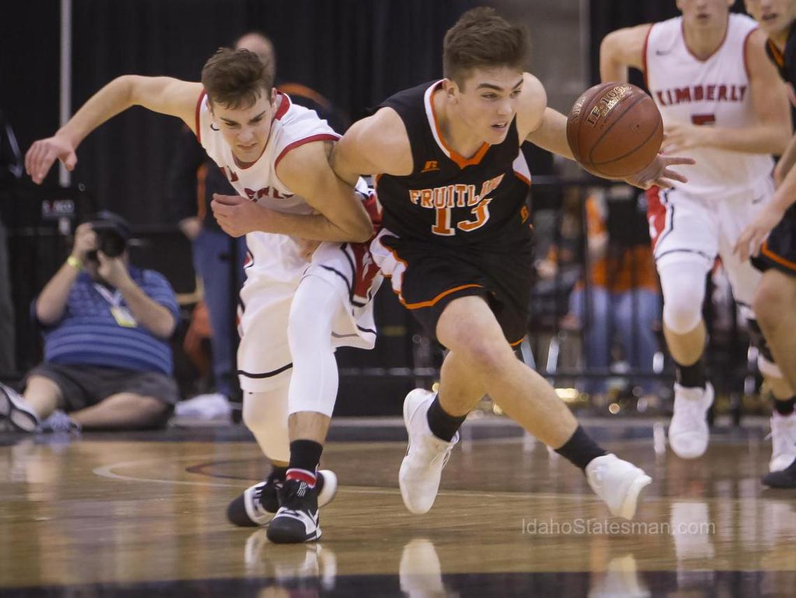 Fruitland guard Cole Eiguren steals the ball from Kimberly’s Connor Golay in last year’s 3A state championship. Eiguren returns as part of Fruitland’s title defense.
