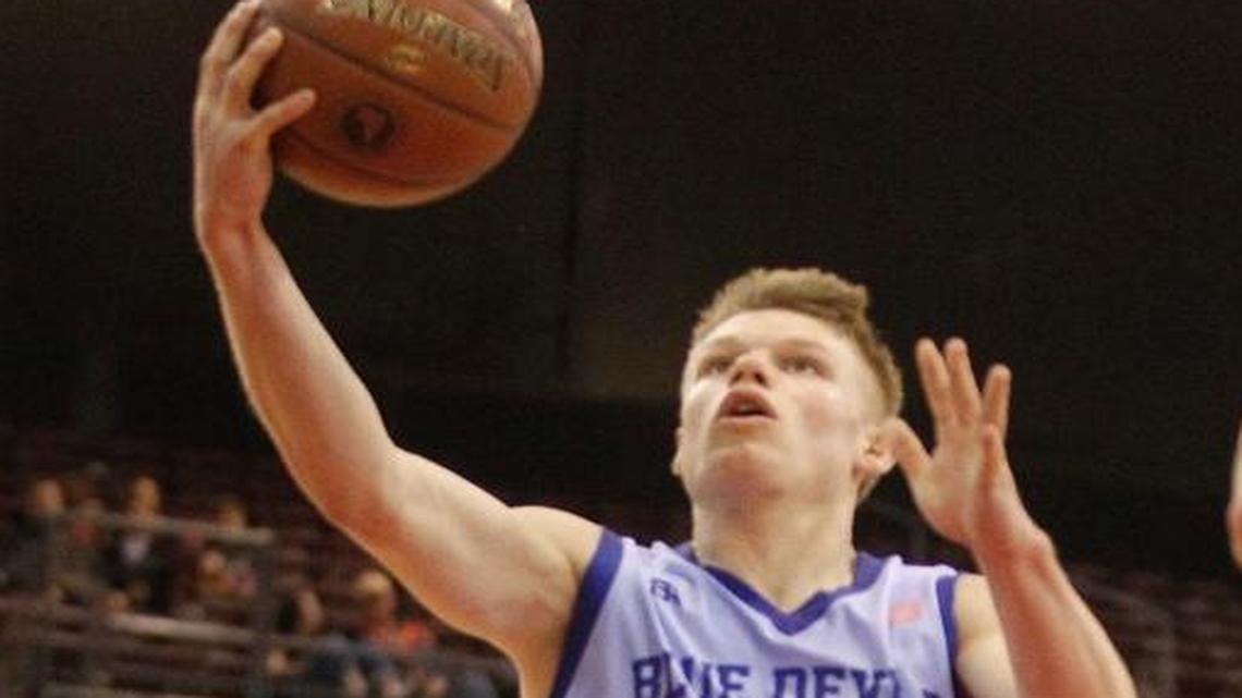 Dietrich’s Garrett Astle goes up for a basket during the second half of the 1A Division II state championship game against Council at the Ford Idaho Center in Nampa.