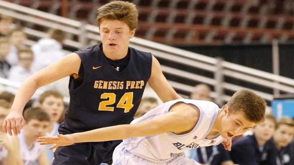 Dietrich’s Jake Smith tries to hold onto the ball in front of Genesis Prep’s Jonny Hillman (24) during the second half of the 1A Division II state championship game March 4 at the Ford Idaho Center in Nampa. Genesis Prep won 68-62.