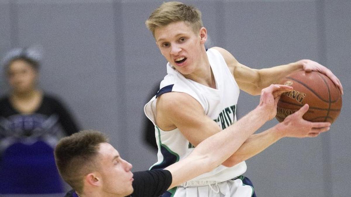 Mountain View’s Drew Smart, right, fights off a steal by Rocky Mountain’s Tyler O'Donnell on Jan. 27 at Mountain View High.