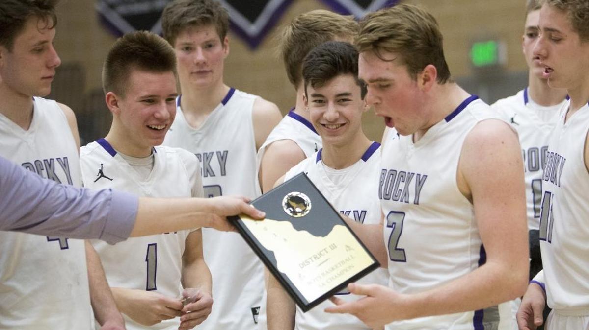 Rocky Mountain is presented the 5A District 3 Tournament trophy last season. The Grizzlies have won the last two district tournaments and entered as the top seed this year.
