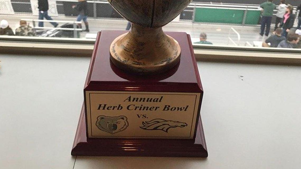 This traveling trophy is awarded to the winner of the annual Herb Criner Bowl.