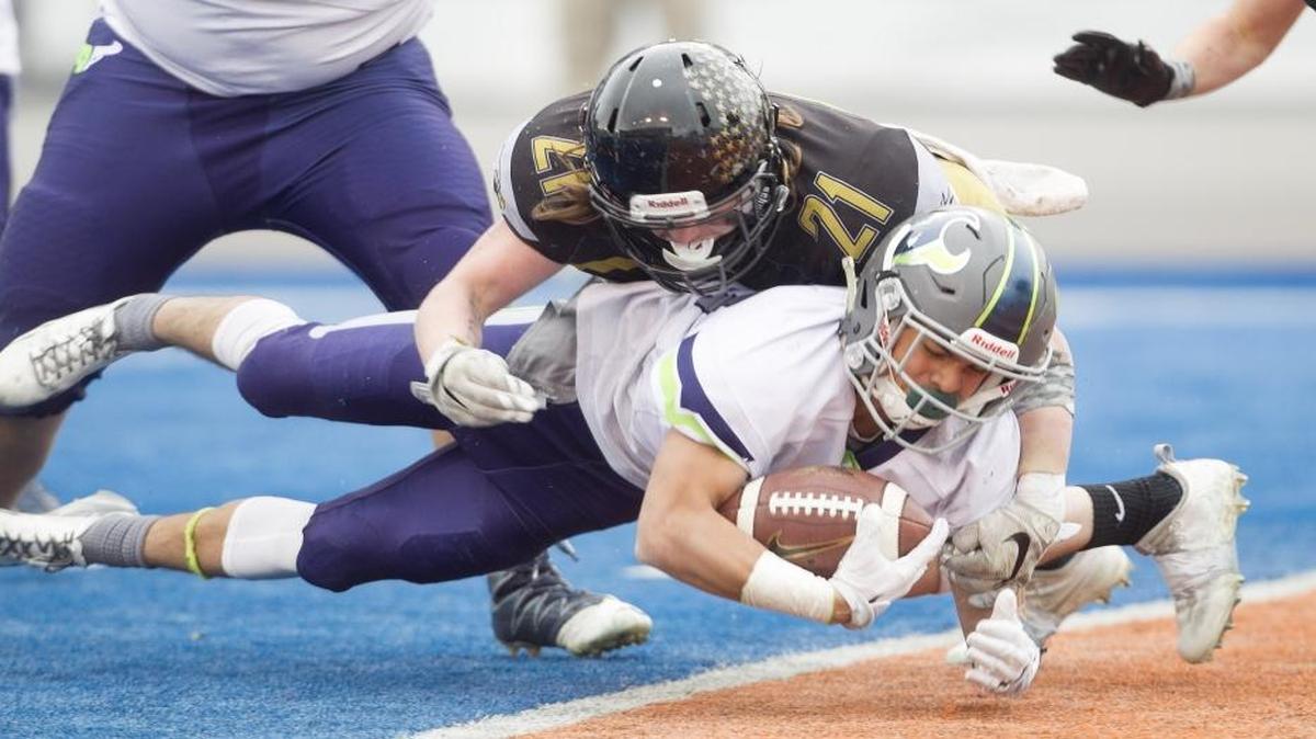 Mountain View’s Keenan Pattwell dives in for a touchdown in the 5A state championship game at Albertsons Stadium. The Mavericks invoked the mercy rule in five of their nine regular-season games last fall.