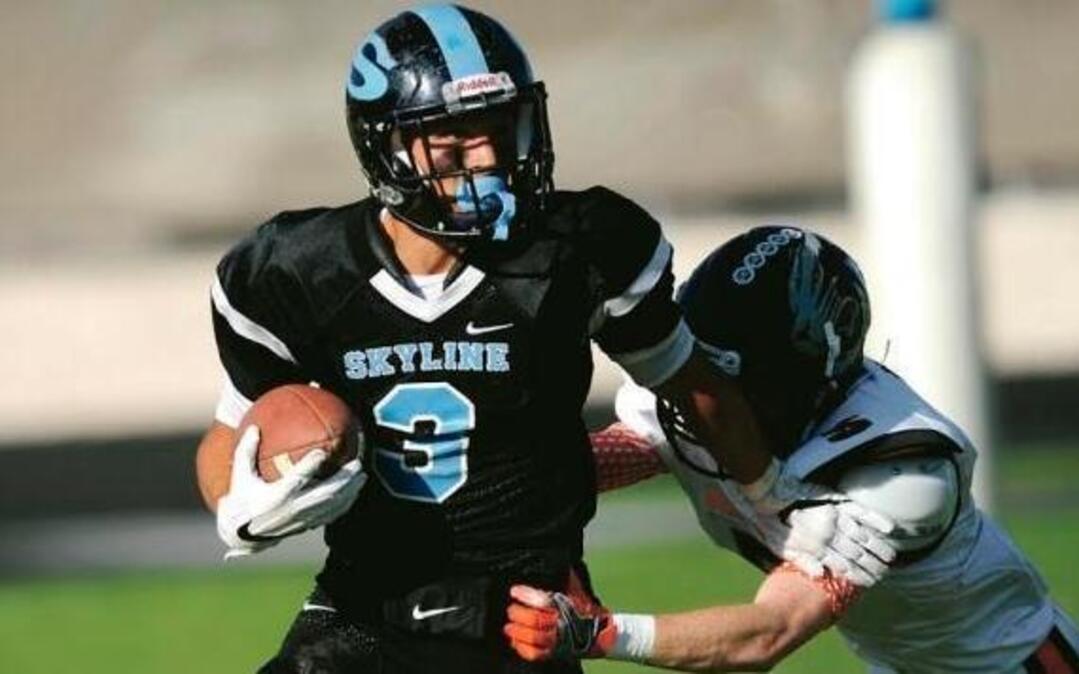 Skyline senior running back David Ames III runs the ball against Idaho Falls on Sept. 24. Skyline won 52-7.