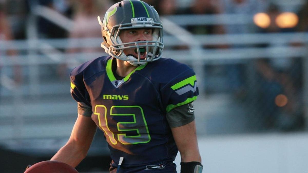 Mountain View’s Josh Buss reacts as he catches a touchdown pass in 2012 against Capital.