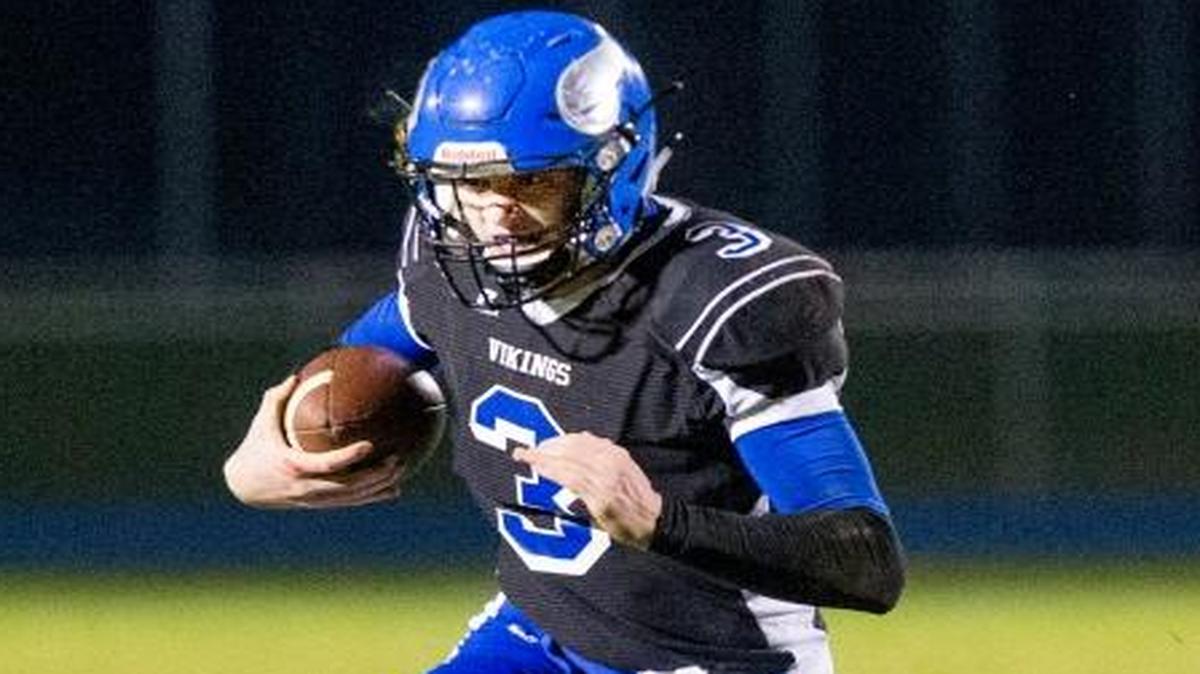 Coeur d’Alene quarterback Colson Yankoff breaks free against Borah during the 5A state playoffs last fall.