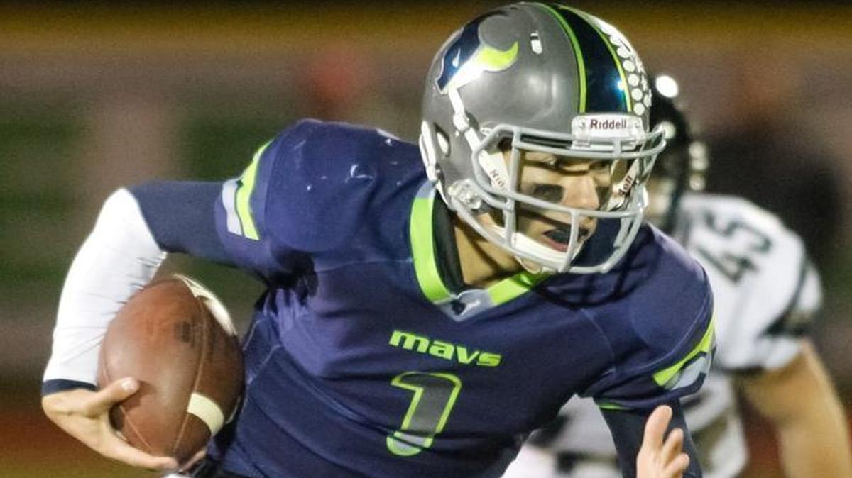 Mountain View quarterback Tucker Rovig looks for running room against Capital in the quarterfinals on Friday.
