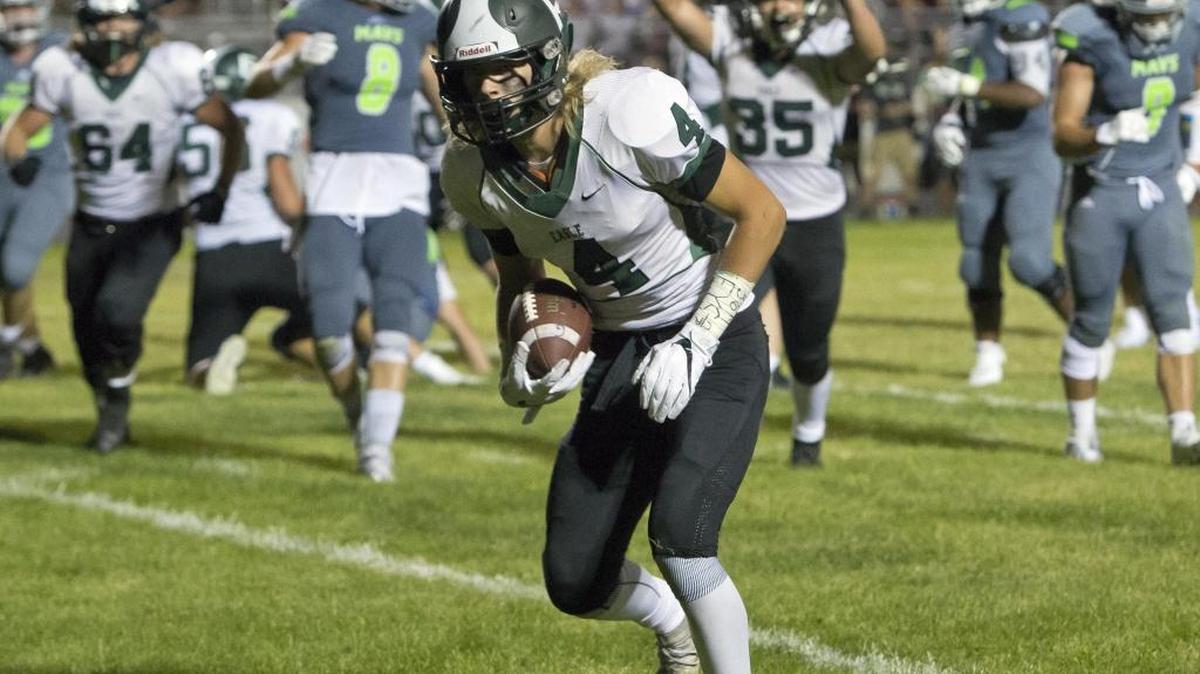 Eagle wide receiver Cole Christensen scores the go-ahead touchdown with under two minutes left in the Mustangs' 22-19 win over Mountain View Friday Aug. 26, 2016 in Meridian.