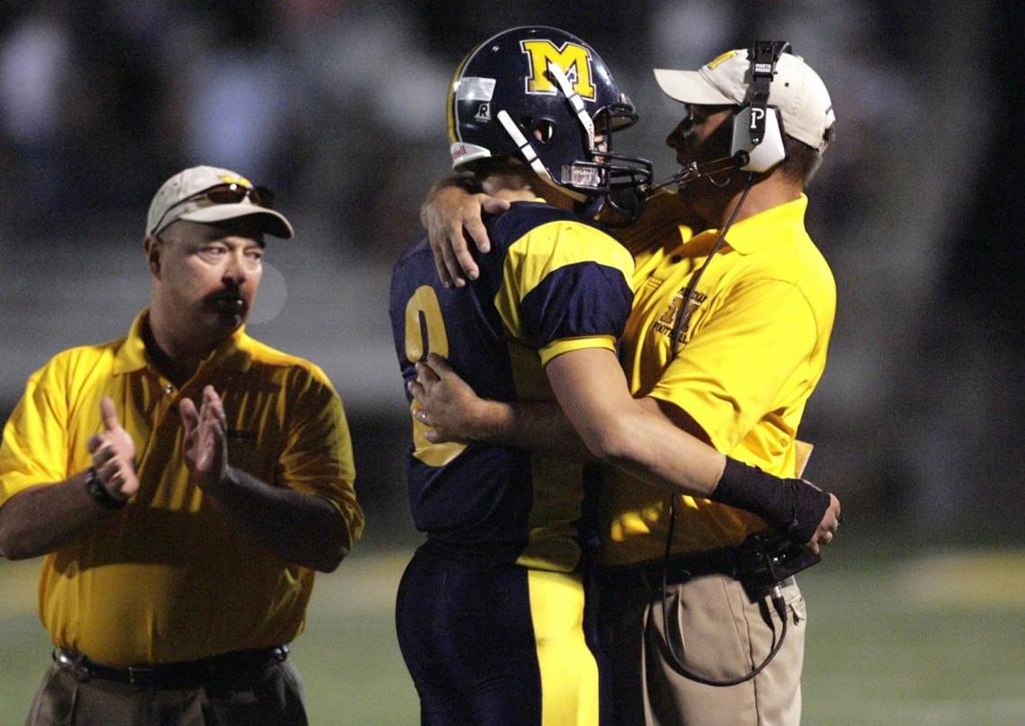Former Meridian High football coach Mike Virden, right, celebrates a touchdown with quarterback A.J. Storms in 2006 during his first stint as the Warriors’ head coach. Virden will return to the Warriors’ sideline again in 2018.