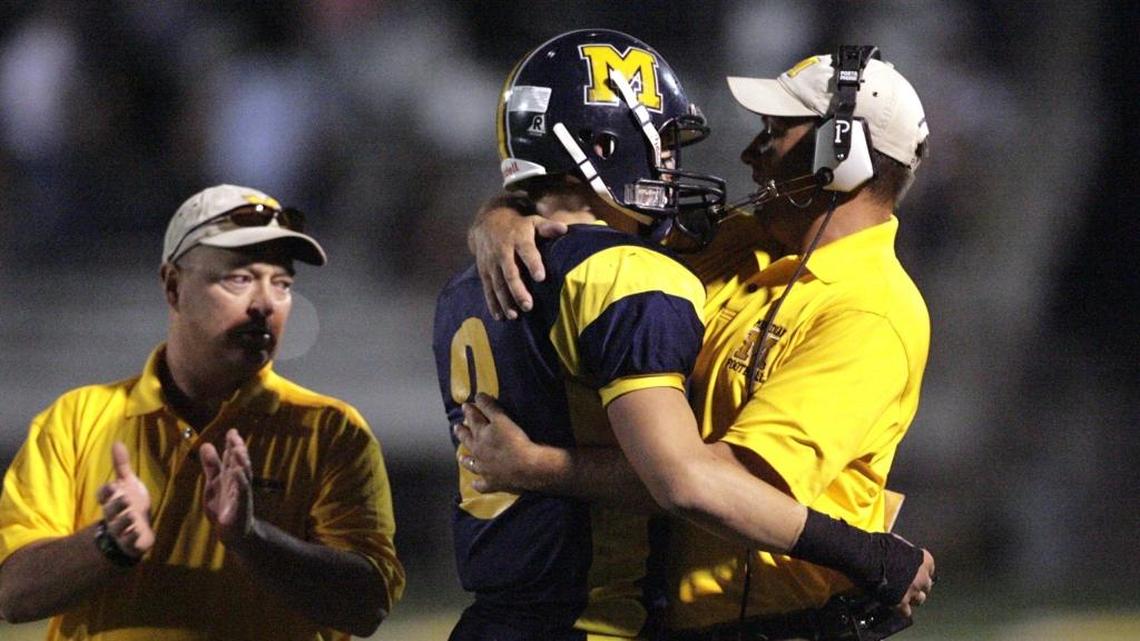 Former Meridian High football coach Mike Virden, right, celebrates a touchdown with quarterback A.J. Storms in 2006 during his first stint as the Warriors’ head coach. Virden will return to the Warriors’ sideline again in 2018.