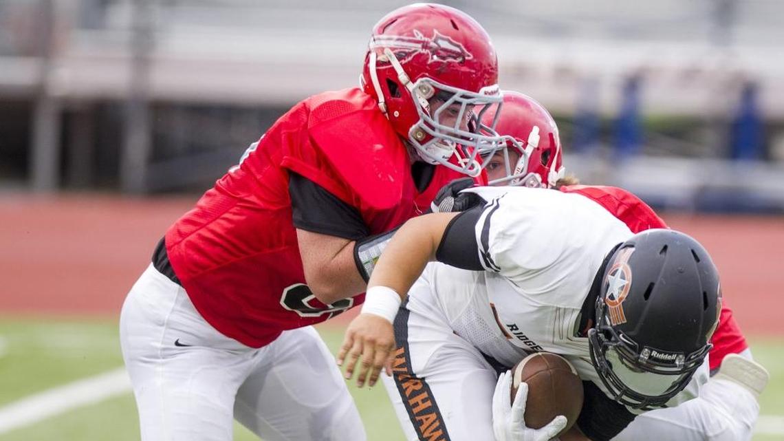 Boise, left, and Ridgevue are two schools that could take advantage of a new rule that allows Idaho high school football teams to move down a classification. Previously, Idaho required all of its high school sports to compete in the same classification. That means Boise could play 4A football while keeping the rest of its programs in 5A, where it won six state titles and finished second in five more sports last school year.