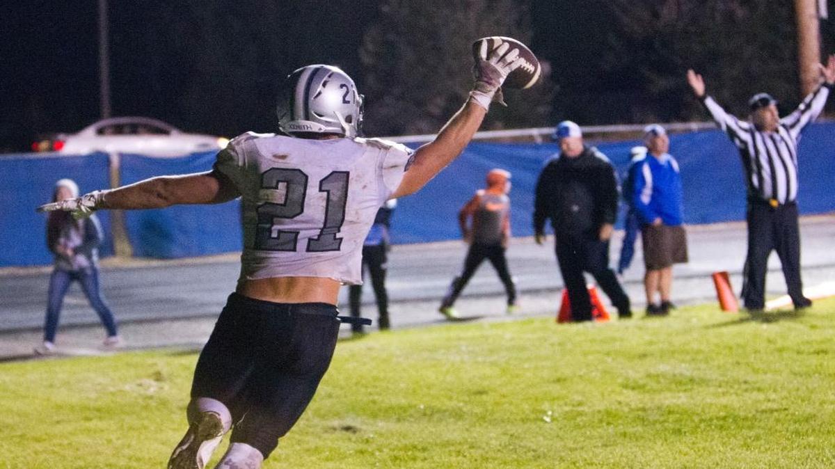 Skyview’s Tyler Crowe celebrates a game-tying touchdown with 1 minute left in the fourth quarter. Matthew Kingston’s extra point gave Skyview a 21-20 win over Emmett.