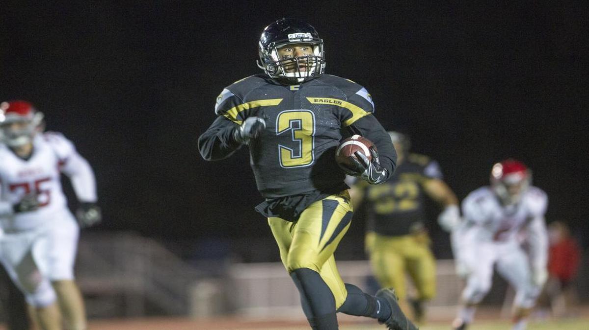 Capital’s Jordan Godeny-Scott returns an interception for a touchdown against Boise on Oct. 6 at Dona Larsen Park.
