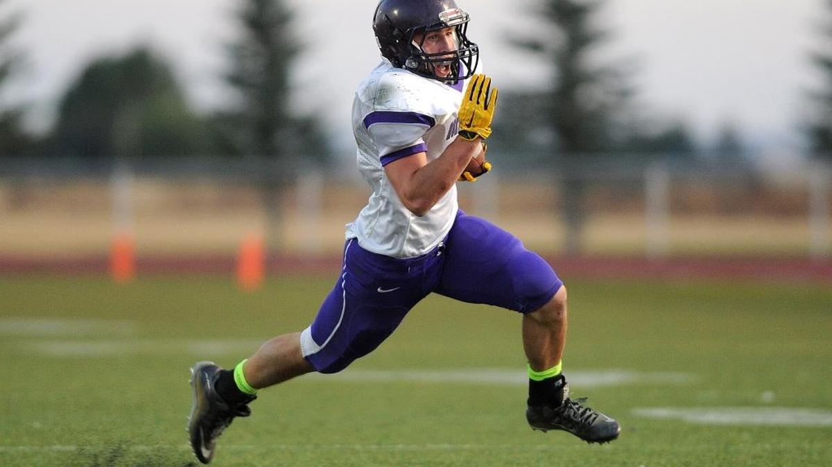 North Fremont running back Tanner Oberhansley breaks free against West Jefferson on Sept. 25 at West Jefferson High.
