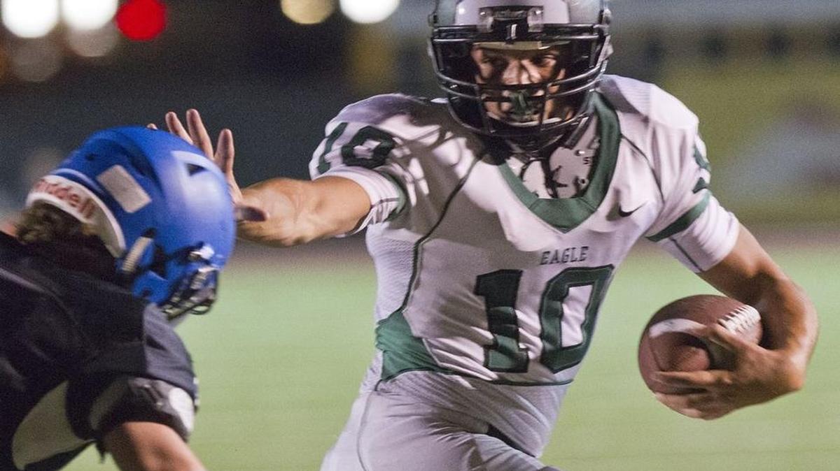 Eagle quarter Slayter Jeffries fights off a Timberline defender last week at Dona Larsen Park.