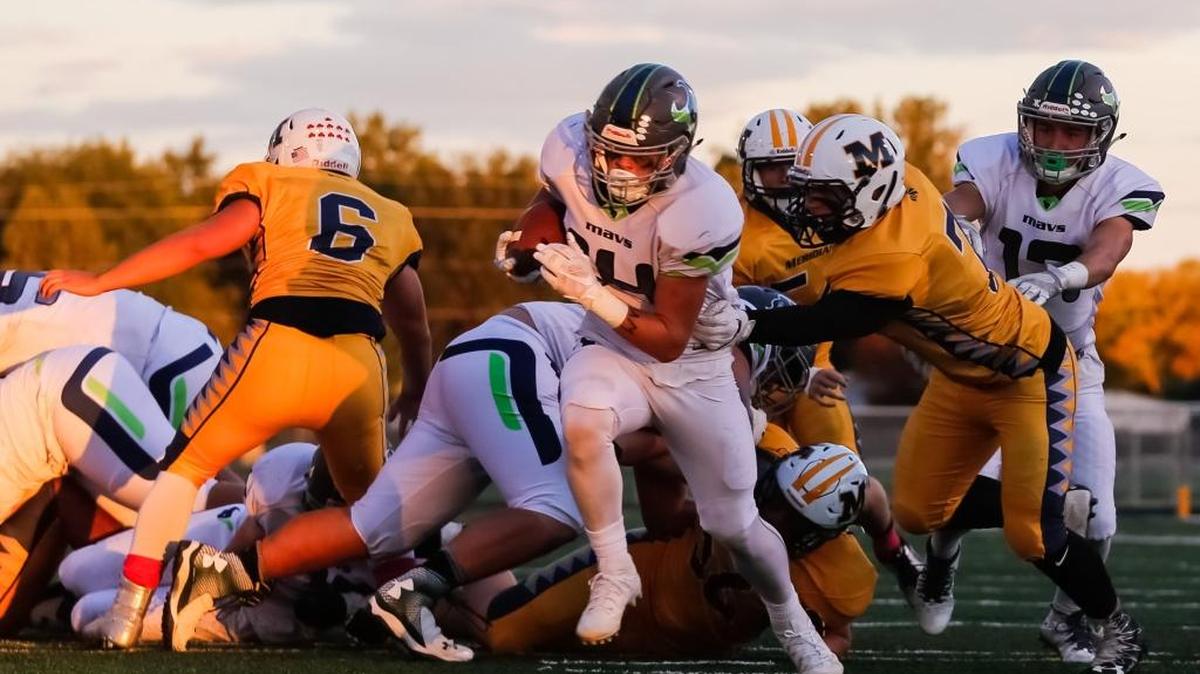 Mountain View’s Cole Franklin runs the ball against Meridian during their 5A Southern Idaho Conference game Friday at Meridian High.