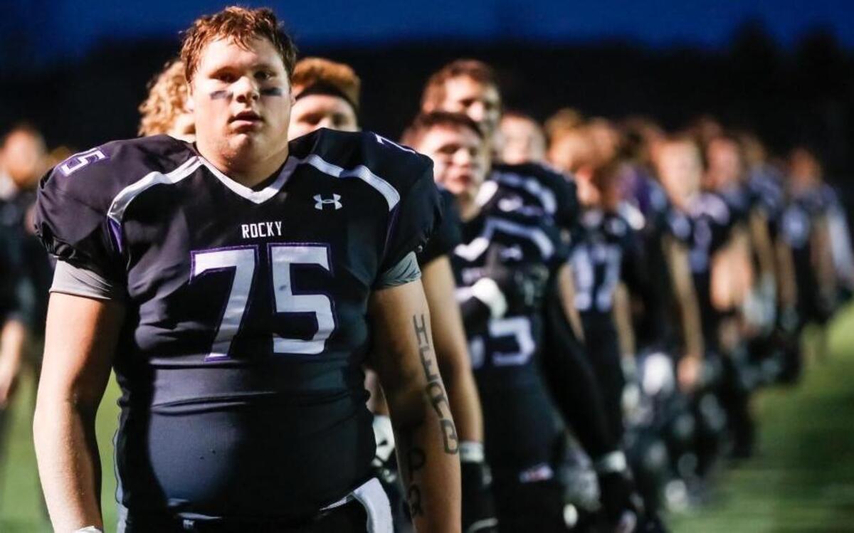 Rocky Mountain’s Connor Wood lines up for the national anthem for an Oct. 28 playoff game against Kuna at Rocky Mountain High.