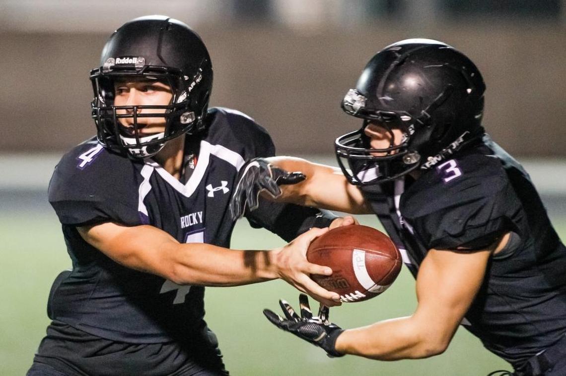 Rocky Mountain’s Tre Page, left, is battling with Colby Jackson to become the Grizzlies’ starting quarterback.