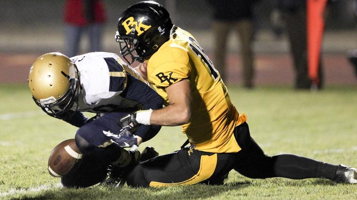 Bishop Kelly’s Joe Sarabia breaks up a fourth-down pass intended for Middleton’s Chase Downs during the fourth quarter of their 4A state quarterfinal game Friday at Bishop Kelly High.