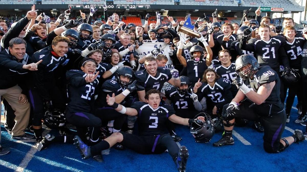 Rocky Mountain celebrates their 5A state championship last year on the blue turf at Boise State’s Albertsons Stadium.