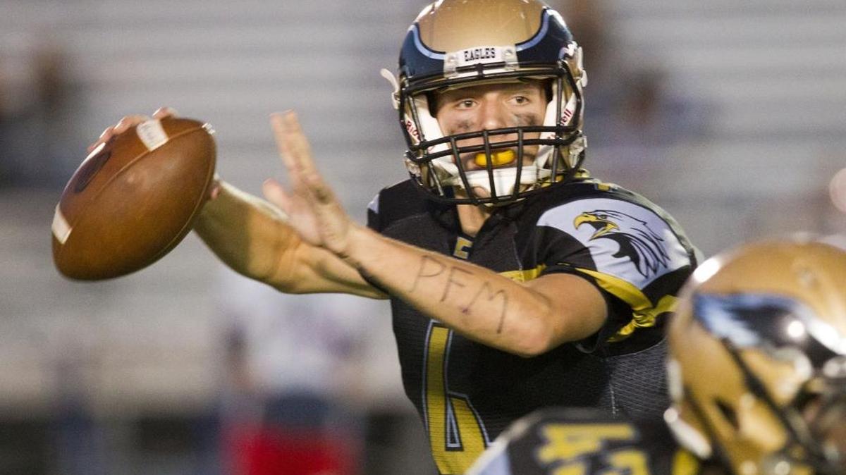 Capital quarterback Drew Korf looks to pass during a Sept. 24, 2015, game against Nampa at Dona Larsen Park.