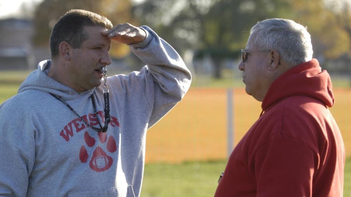 Weiser coach John Srholec Jr., left, and his father and assistant coach, John Srholec Sr., have coached the Wolverines for the majority of the past four decades.