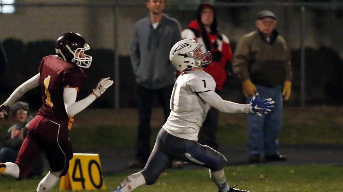 Grangeville receiver Austin Parks hauls in a tipped ball for one of his 48 receptions this season in the semifinals at Nampa Christian.