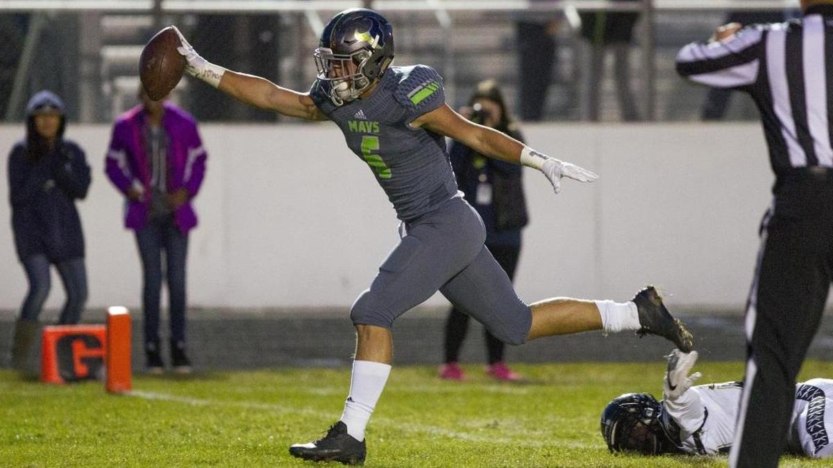 Mountain View tight end Joey Elwell crosses the goal line after a midfield pass in the first quarter Oct. 20 in Meridian. Elwell and the Mavericks host Rigby in the 5A state quarterfinals Friday.