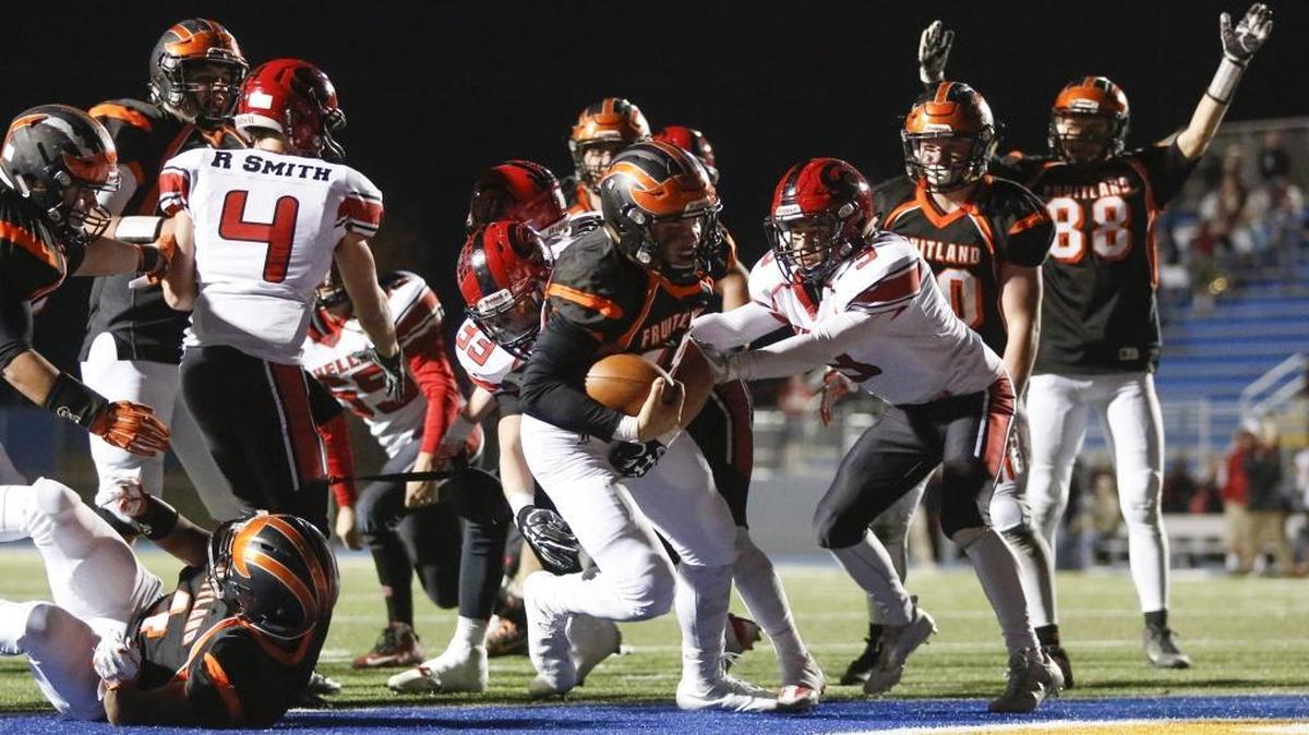 Fruitland’s Cole Eiguren scores a touchdown against Shelley during the 3A state championship football game in Middleton on Saturday, Nov. 19, 2016. Fruitland won 35-28.