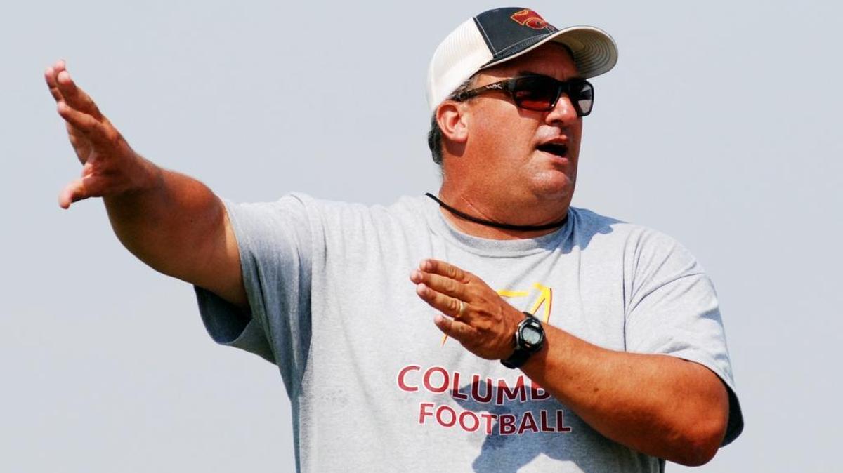 Columbia football coach Rich Davis leads his team during a 2016 practice.