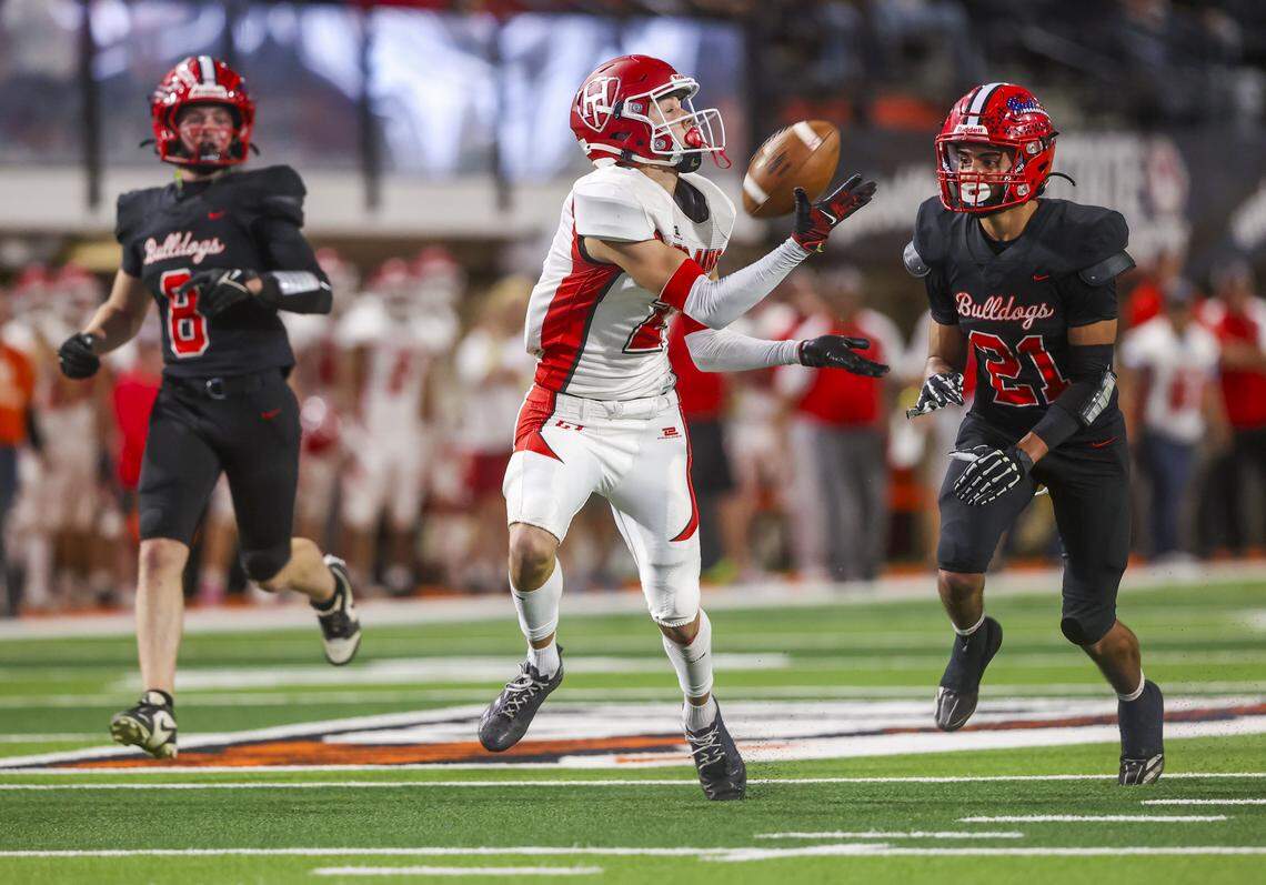 Homedale junior Alec Campos caught eight passes for 153 yards and three touchdowns to lead the Trojans to a 29-21 victory over Kimberly for the 4A state title. 