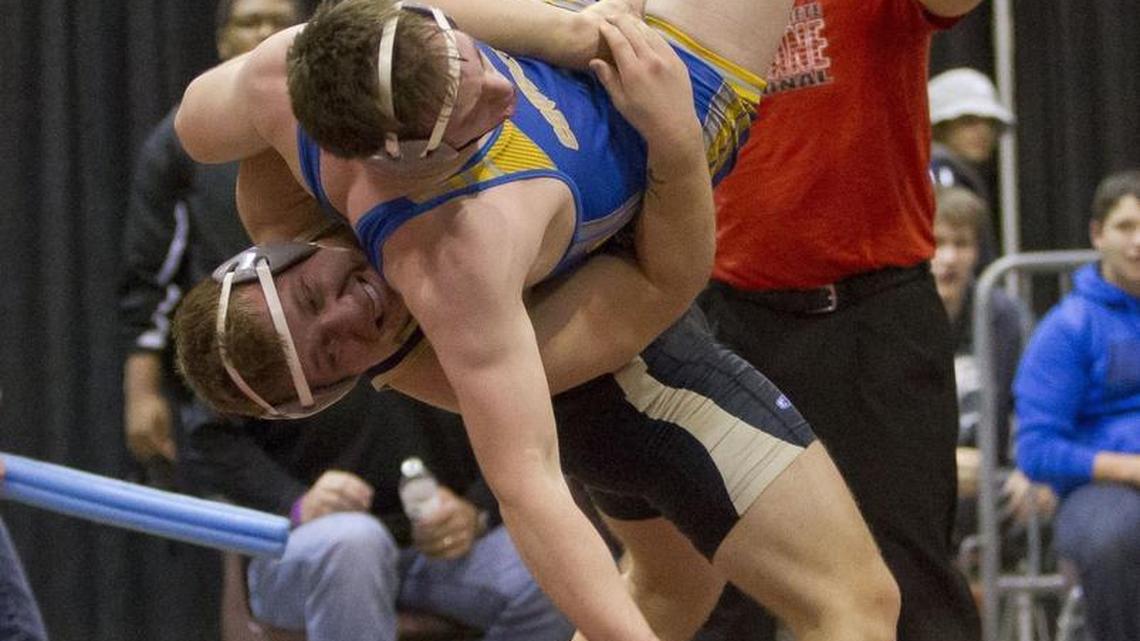 Levi Perry has a scholarship offer from North Idaho College, and Kuna coach Pat Owens said he could transition to Division I if he gets his academics on track. “He’s one of the stronger kids I’ve ever coached,’’ Owens said. Above, Perry takes down an opponent at Rollie Lane last month in Nampa.