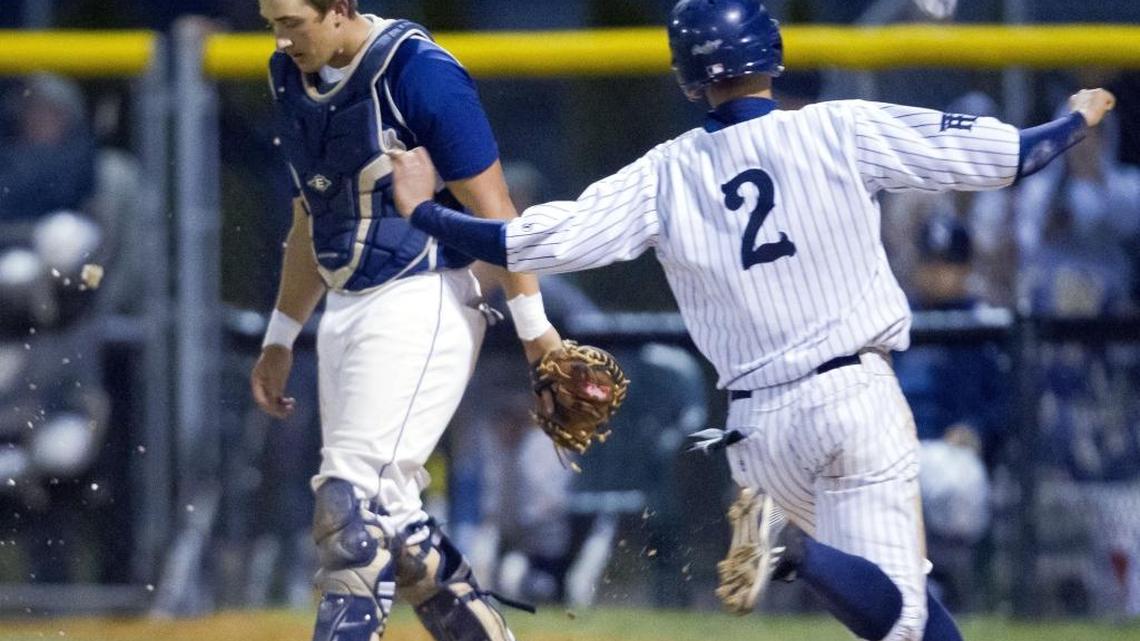 Skyview catcher Kody Graves walks away as Twin Falls’ Cody Root scores the winning run in the bottom of the seventh inning of a 2015 4A state semifinal at Bishop Kelly High. Twin Falls will host the 4A state tournament this year at the College of Southern Idaho.