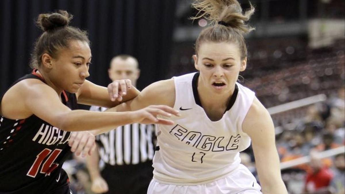 Eagle High’s Abby Mangum drives to the basket against Highland during the first round of the 5A girls basketball state tournament Thursday at the Ford Idaho Center in Nampa.