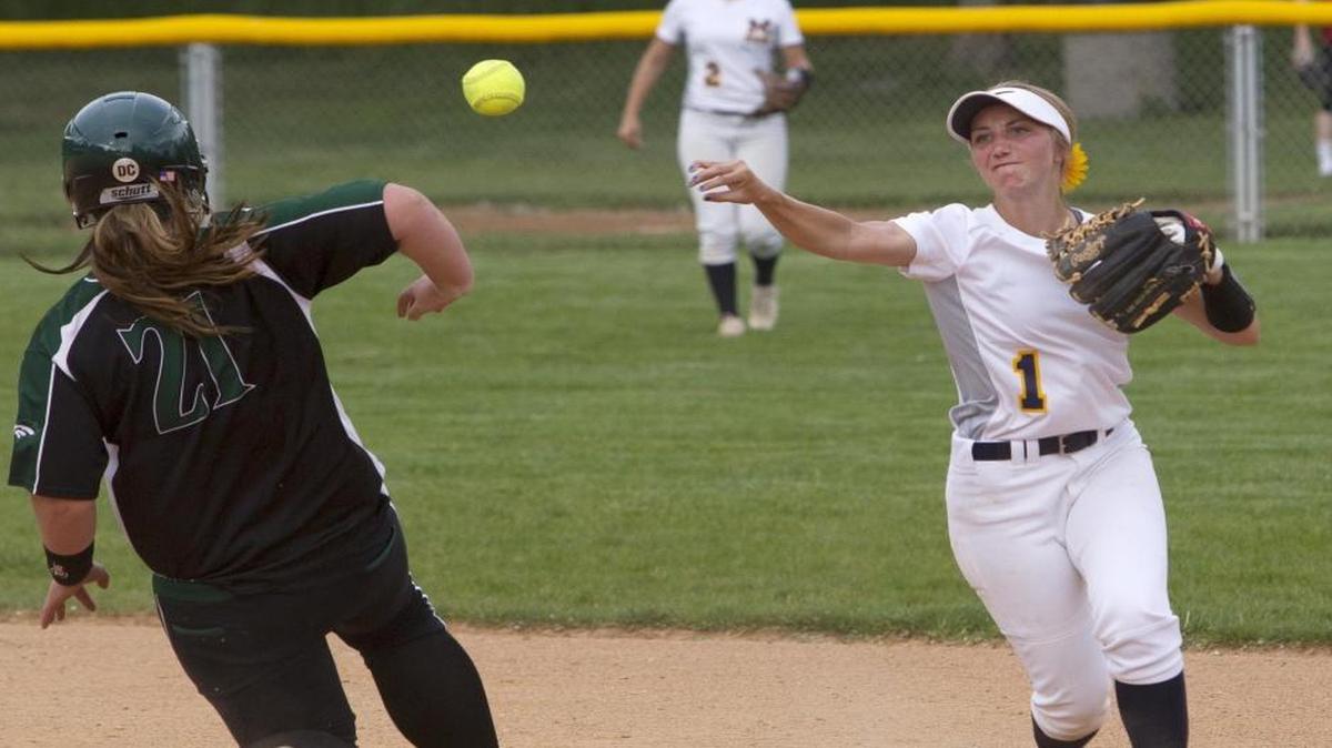 Meridian shortstop Lexi Knauss turns a double play in the 5A District Three championship game against Eagle.