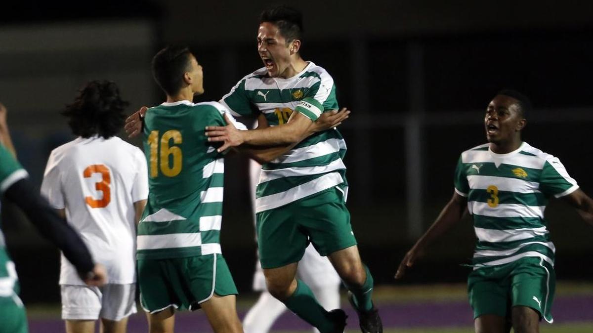 Borah’s Ahmed Ibrahimovic celebrates his game-winning goal in the 5A state championship game against Post Falls on Oct. 21 at Rocky Mountain High.
